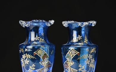 Paire de vases en verre teinté bleu et émail doré, col ourlé. Epoque Napoléon III...
