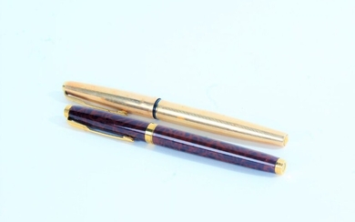 Parker - two fountains pens, the first with wood effect case and 14k nib, the second with 12ct
