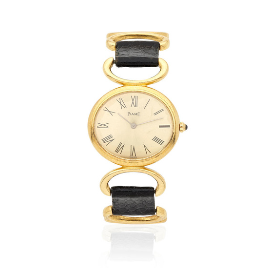 Piaget. A lady's 18K gold manual wind wrsitwatch Piaget. Montre...