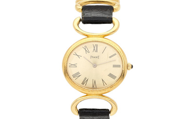 Piaget. A lady's 18K gold manual wind wrsitwatch Piaget. Montre...