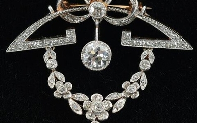 Platinum and 18K yellow gold diamond brooch and