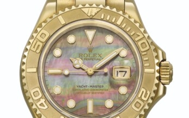 ROLEX. A HIGHLY ATTRACTIVE 18K GOLD AUTOMATIC WRISTWATCH WITH SWEEP CENTRE SECONDS, DATE, MOTHER-OF-PEARL DIAL AND BRACELET