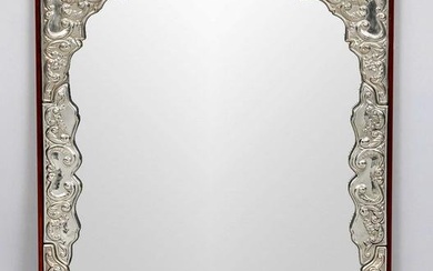 Rectangular wall mirror, Italy, 20th c., plated, matching curved applications with relief