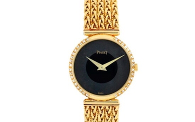 Reference 20052 P 50 A yellow gold and diamond-set bracelet watch, Circa 1980