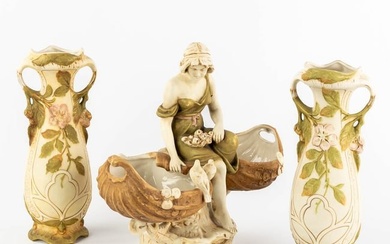Royal Dux, a pair of vases and a lady with two baskets. Polychrome porcelain. (L:17 x W:36 x H:32