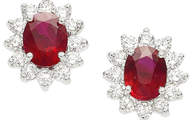 Ruby, Diamond, White Gold Earrings Stones: Oval-shaped rubies weighing...