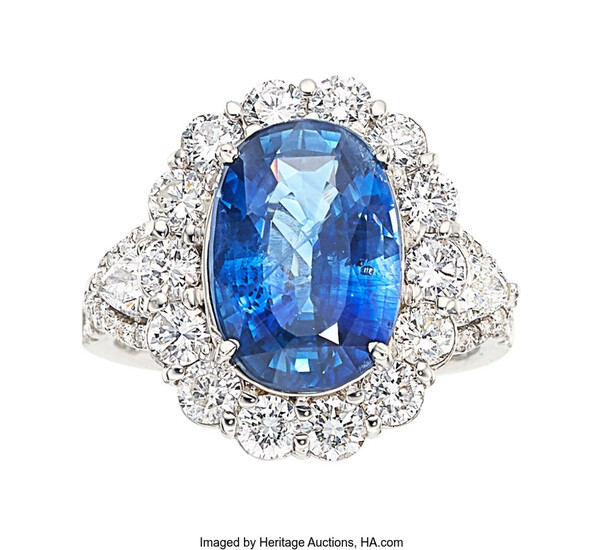 Sapphire, Diamond, White Gold Ring The ring features an...