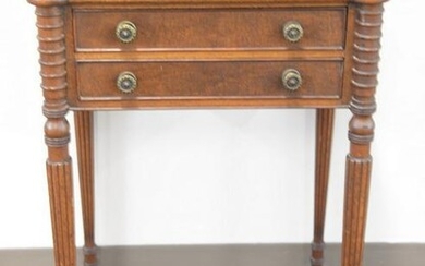 Sheraton mahogany two drawer stand with turret corners