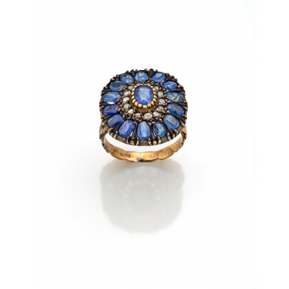 Silver and yellow 9K gold ring with irregular diamonds and oval sapphires, g 5.53 circa size 9/49. (slight defects)