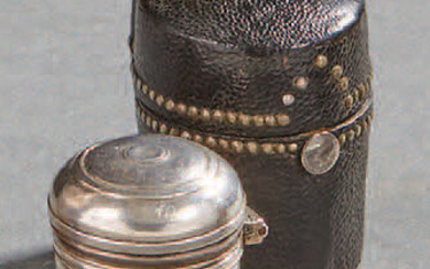 Small silver ointment jar in its black studded...