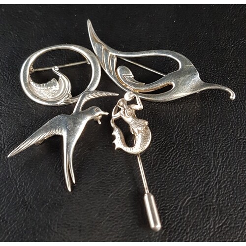 THREE SILVER OLA GORIE BROOCHES AND A STICK PIN the brooches...