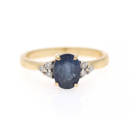 TRESER H SARL: A sapphire and diamond ring set with an oval-cut sapphire flanked by brilliant-cut diamonds, mounted in 18k gold. Size 54.