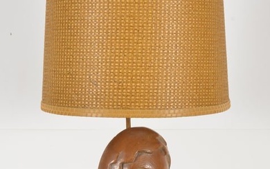 Tasack mid century modern carved wood lamp. Figural woman's head. Original shade. 34.25in high.