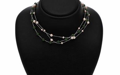 NOT SOLD. Three necklaces respectively set with numerous cultured pearls and numerous beads of nephrite,...