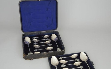 Twelve Victorian Silver Dessert Spoons and Four Serving