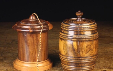 Two 19th Century Treen Containers: A turned figured walnut barrel shaped tobacco jar with ring moul