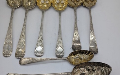 Two pairs of silver berry spoons, together with other...