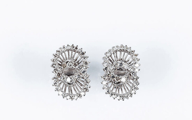 Vintage earrings in white gold, with openwork motif of...