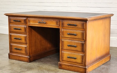 Vintage maple double pedestal nine-drawer desk, with tooled black leather...