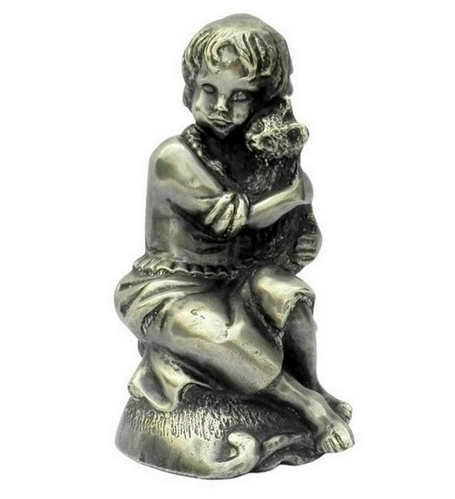 Vintage sculpture of a girl with a cat in her hands