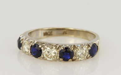 White gold (tests 18ct) diamond and sapphire half eternity r...