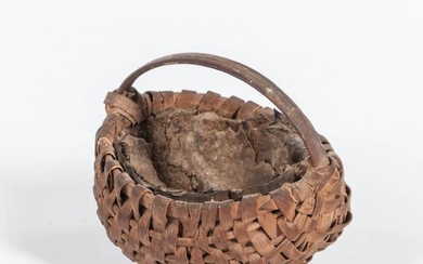 Miniature Melon Basket, America, early 20th century, round form with arched handle and leather lining, ht. 2, dia. 2 in.Provenance: Dav