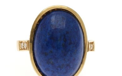 A lapis lazuli- and diamond ring set with a lapis lazuli encircled by numerous diamonds, mounted in 18k gold. Front 15.5×21 mm. Size 55.