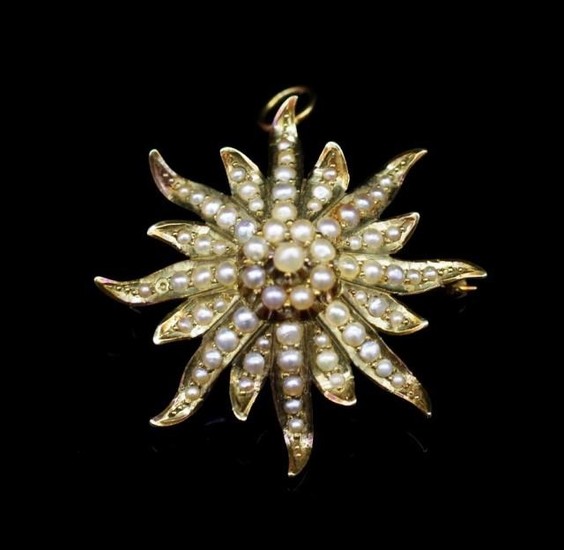 14ct yellow gold and seed pearl "star" pendant brooch. Circa...