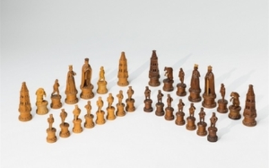 30 carved lime and plum wood chess pieces