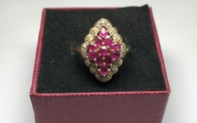 White gold ring (18 kt) with rubies and diamonds
