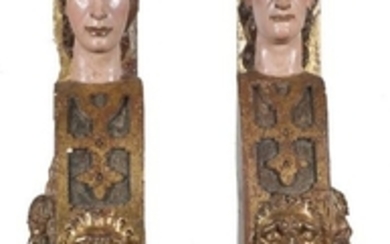 Pair of carved, gilded and polychromed wooden cary…