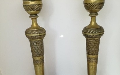 A pair of French 19th century candle sticks of gilded bronze with fluted stems upon circular base. H. 25.3 cm. (2)
