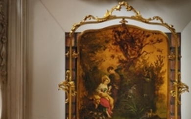 A French gilt-bronze and european varnish firescreen, last quarter 19th century