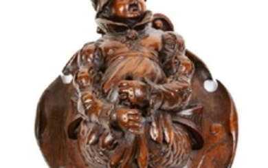 A German Carved Wood Figural Wall Hanging