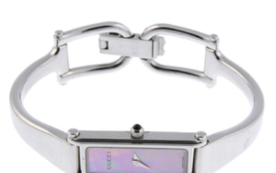 GUCCI - a lady's stainless steel 1500L bracelet watch with two Gucci watches.