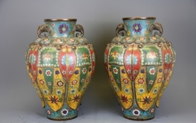 An impressive pair of Chinese cloisonne on bronze vases with elephant head handles, H. 33cm.