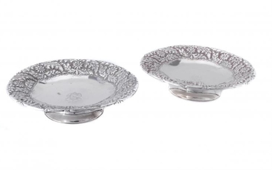 A pair of late Victorian silver shaped circular pedestal dishes by Horace Woodward & Co.
