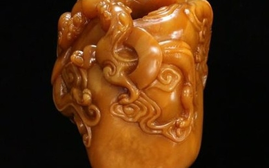A SHOUSHANTIAN HUANG STONE CARVED DRAGON PLAYING BEAD