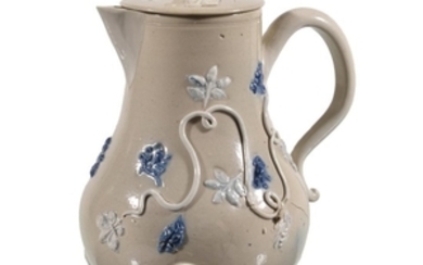 A Staffordshire salt-glazed stoneware drab bodied milk jug and cover