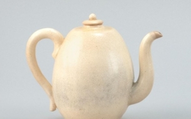 SATSUMA POTTERY TEAPOT In seed form. With white crackle glaze. Height 5.5".