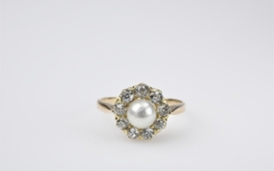 A 14k gold, platinum and pearl cluster ring