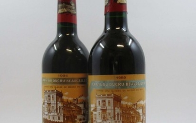 9 bouteilles 5 bts : CHÂTEAU DUCRU BEAUCAILLOU 1989 2è GC Saint Julien (étiquettes fanées)