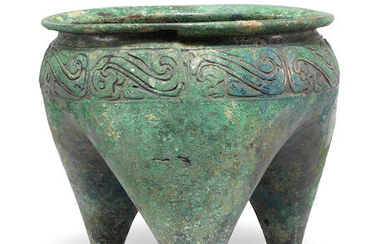 An archaic bronze tripod ritual food vessel, li