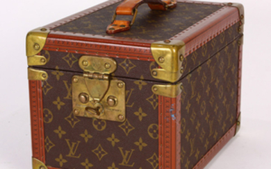 Louis Vuitton Paris Boite Flacons travel vanity box, having a hard shell case with signature monogrammed canvas body, continuous LV...