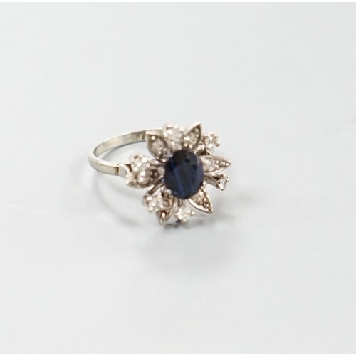 A 1930's 18ct white gold, sapphire and diamond cluster set f...