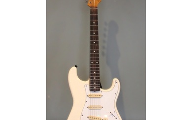 A 1988 Fender Stratocaster electric guitar, serial number E7...