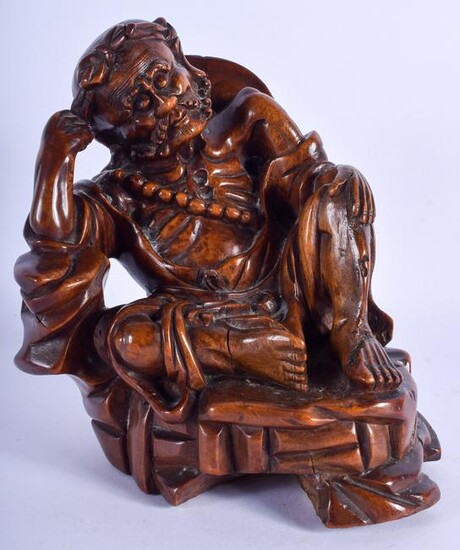 A 19TH CENTURY CHINESE CARVED ROOTWOOD FIGURE A BUDDHA