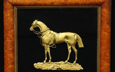 A 19th century gilt metal applique, cast as a race horse, ma...