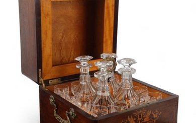 A 19th century rosewood and marquetry inlaid liqueur decante...