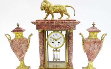 A 19thC French Three-Piece Clock Garniture, by Marti, having...